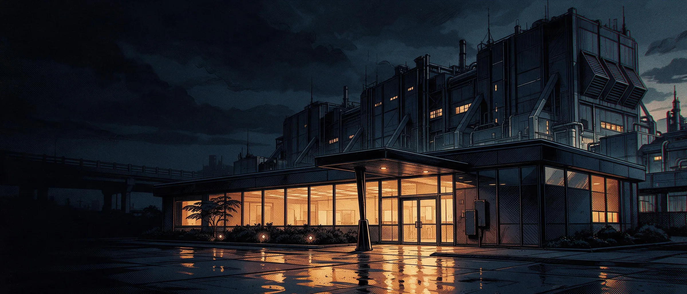 The reception of an industrial plant at dusk, windows lit and the production halls behind it